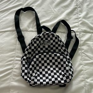 Vans “Off the wall” black and white checkered mini backpack